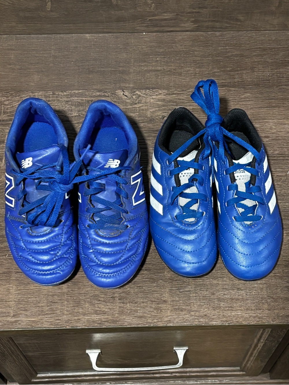 Bundle: two Soccer cleats, size 13Y and 1Y